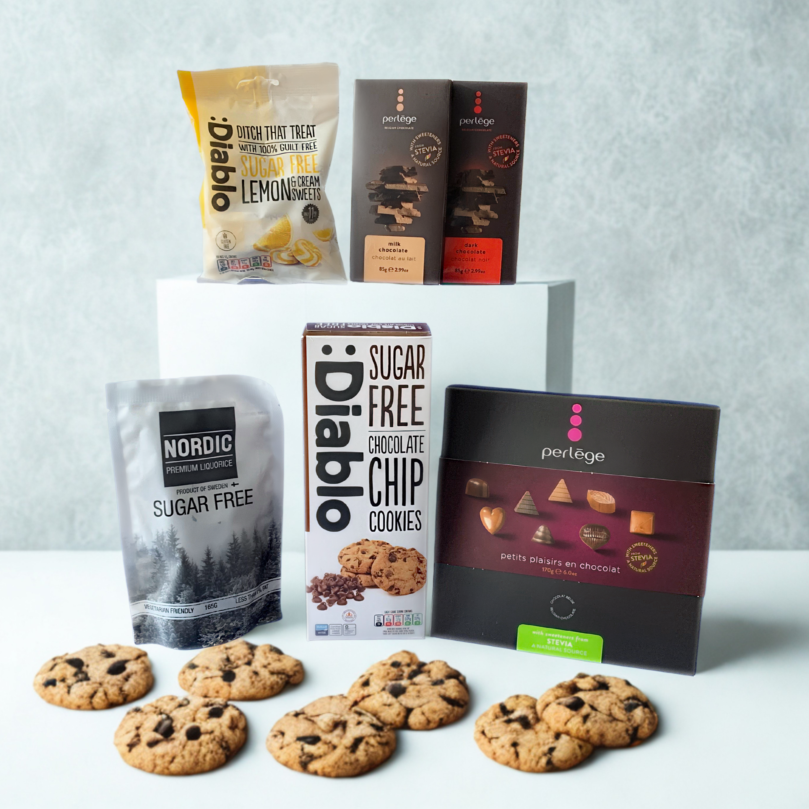 Assorted sugar-free cookie products including Diablo, Nordic, and Perlege on a light gray background.